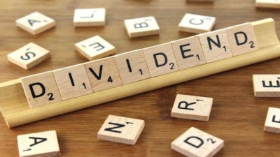 dividend scrabble piece spelling
