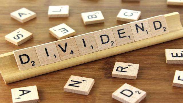 dividend scrabble piece spelling