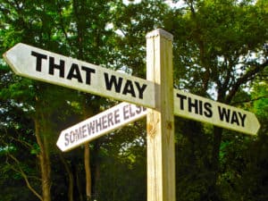 sign depicting indecision opportunity the way forward