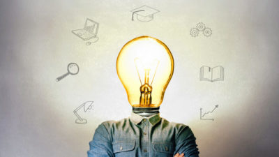 Concept of a new idea. Light bulb as head