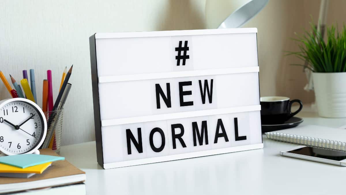 New normal sign on desk