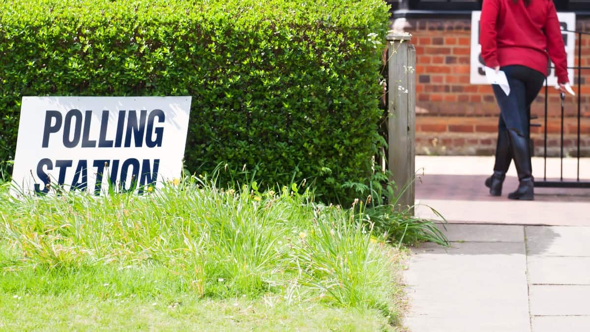 Polling Stations, as depicted with a woman taking her polling card to cast her vote