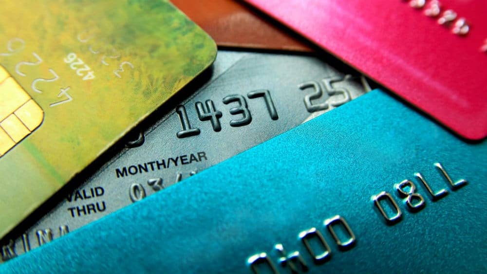 A stack of credit cards piled on top of each other