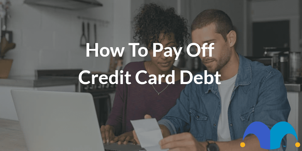 Couple researching online with the text “How to pay off credit card debt” and The Motley Fool jester cap logo
