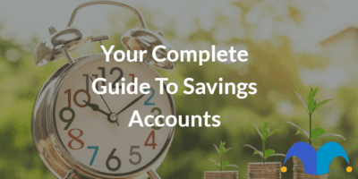 Clock next to growing pile of money with the text “Your Complete Guide To Savings Accounts” and The Motley Fool jester cap logo