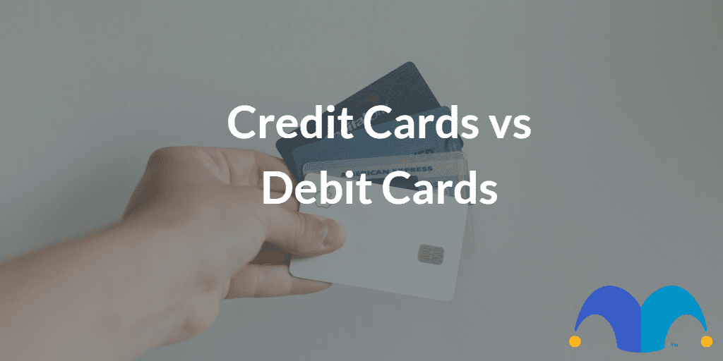 Young casual man and girl using laptop while looking at invoice and plan the budget to save. with the text “Credit cards vs debit cards” and The Motley Fool jester cap logo