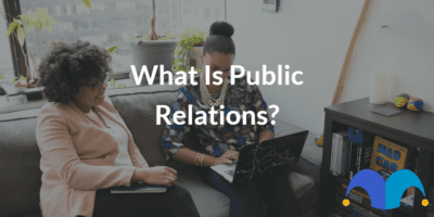 PR professional working with client with the text “What Is Public Relations?” and The Motley Fool jester cap logo