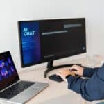 Business woman creating images with artificial intelligence inside office
