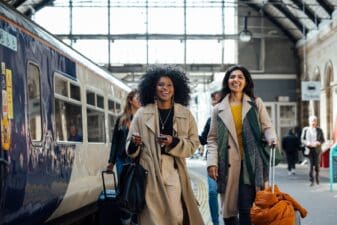 Two mid adult women enjoying a friends reunion city break for the weekend in Newcastle upon Tyne, England.