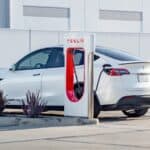 Tesla car at super charger station